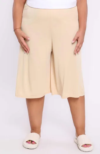 Pantaloni semi-aluneci de culoare bej Mewa