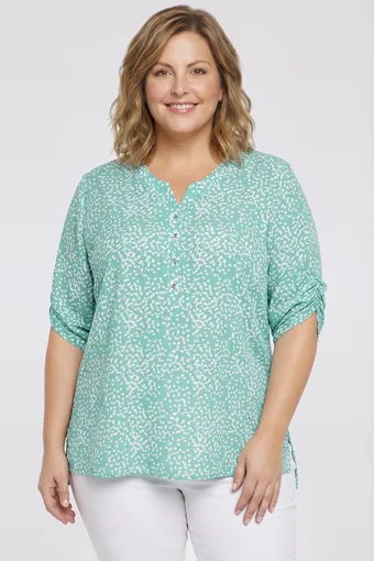 Bluză turcoaz deschis cu modele albe